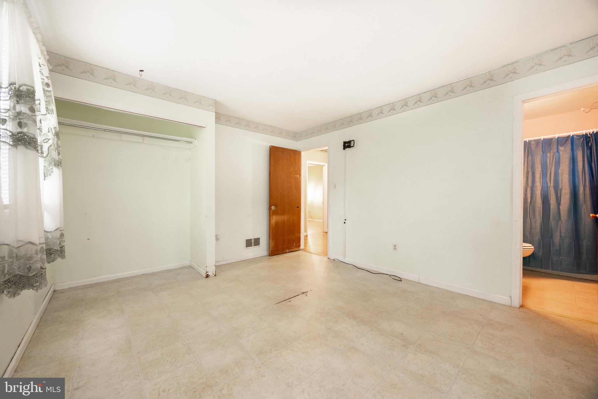 175 Levengood Road Douglassville, PA 19518 - Photo 16 of 33 an empty room with a natural light