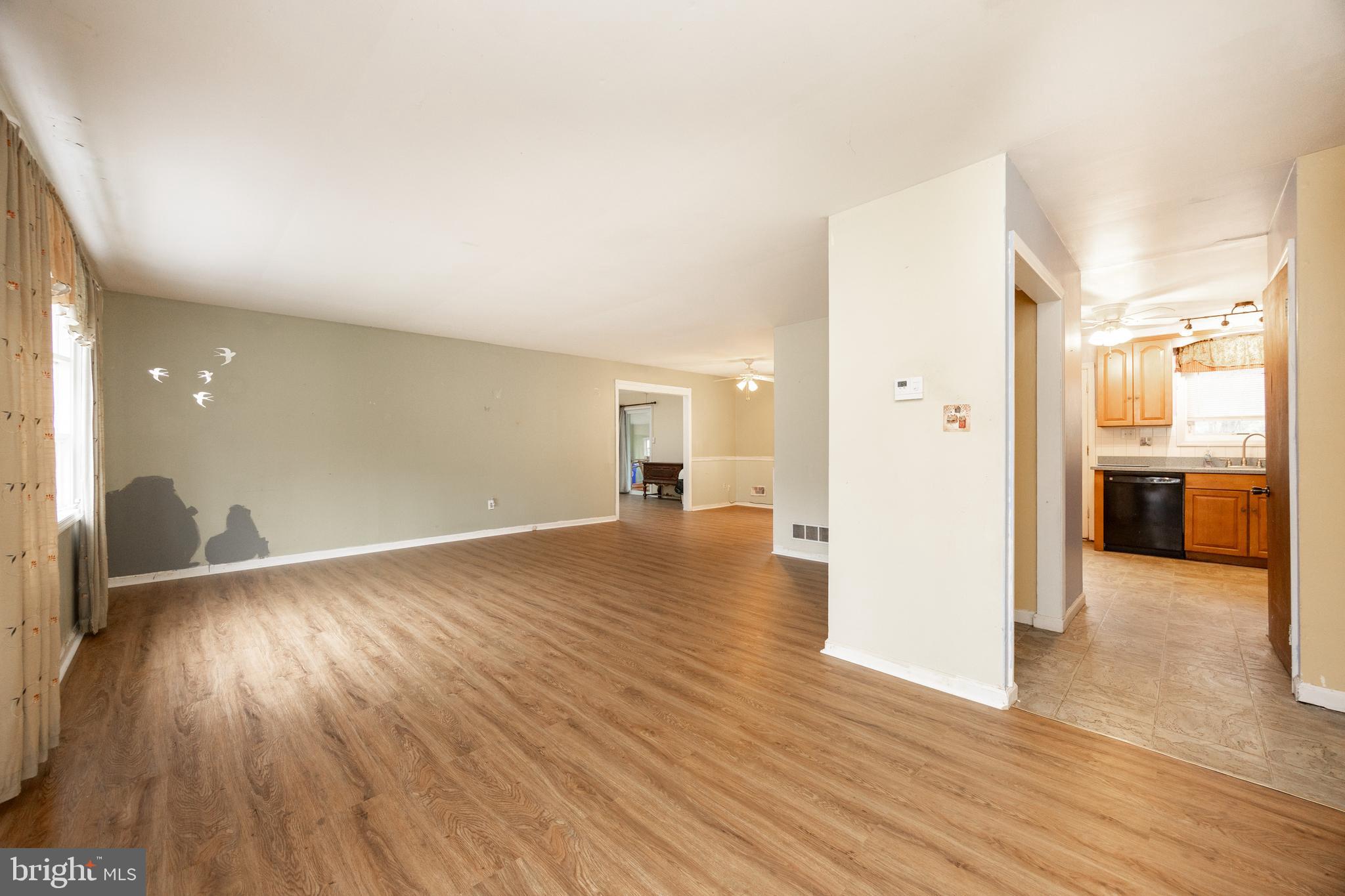 175 Levengood Road Douglassville, PA 19518 - Photo 7 of 33 a view of a living room with a wooden floor