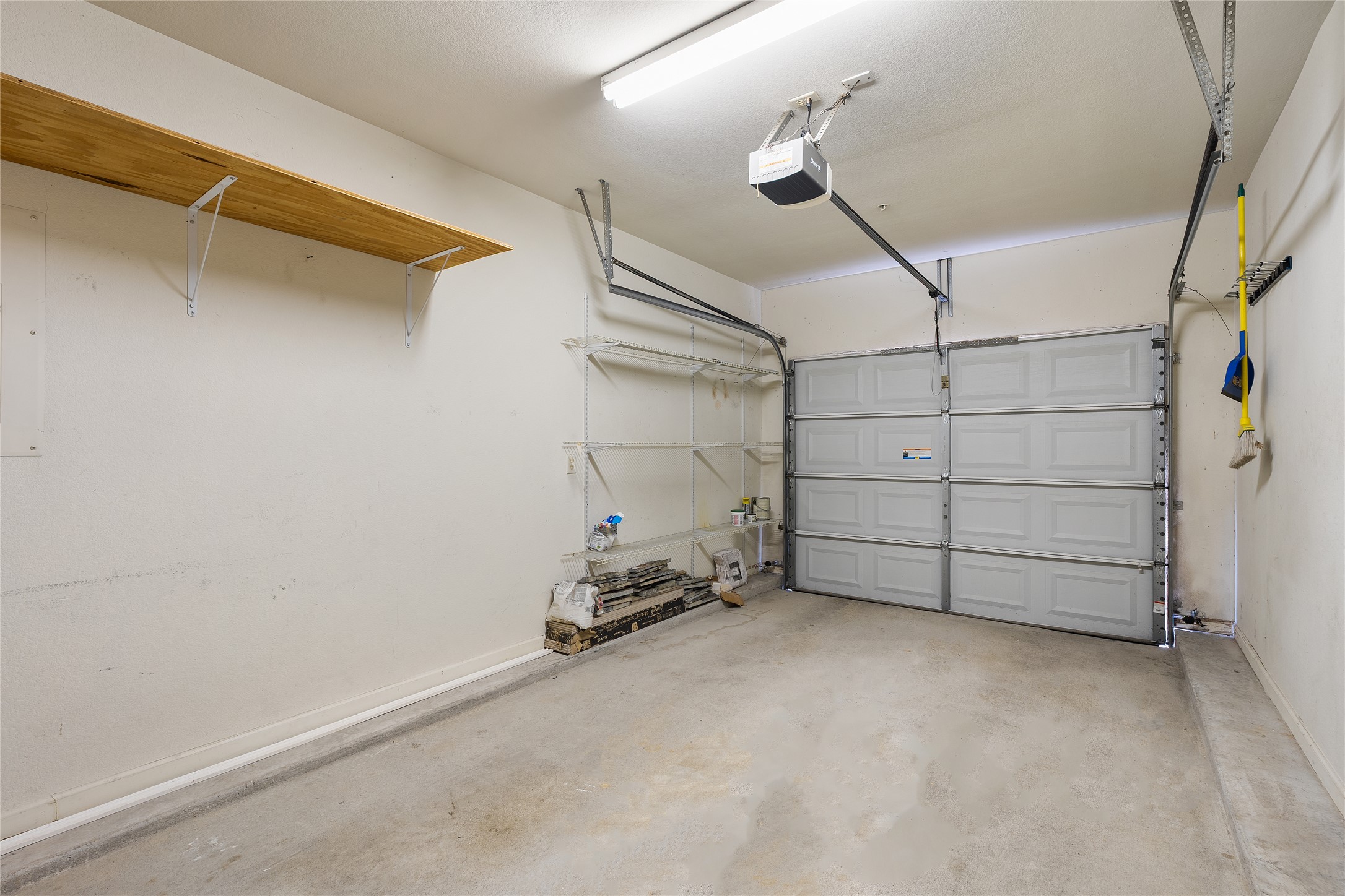 11203 Ranch Road 2222, Unit 1402 Austin, TX 78732 - Photo 20 of 22 Single car attached garage