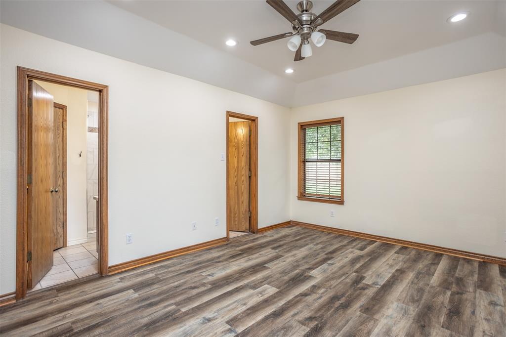 292 Old Spanish Trail Valley View, TX 76272 - Photo 23 of 40 Master Bedroom with wood finished floors, a ceiling fan, and recessed lighting