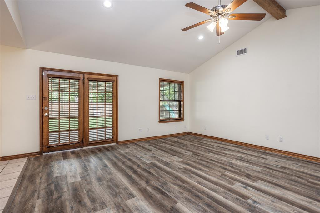 292 Old Spanish Trail Valley View, TX 76272 - Photo 35 of 40 Living leading to deck featuring wood finished floors, recessed lighting, and ceiling fan