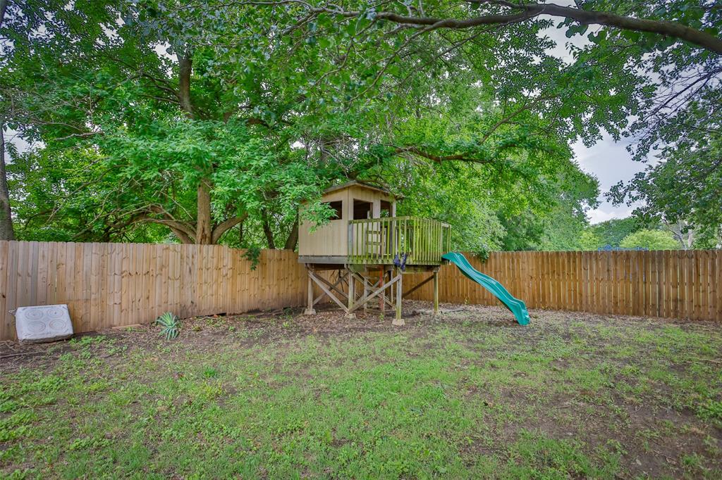 292 Old Spanish Trail Valley View, TX 76272 - Photo 38 of 40 Fenced backyard featuring a playground
