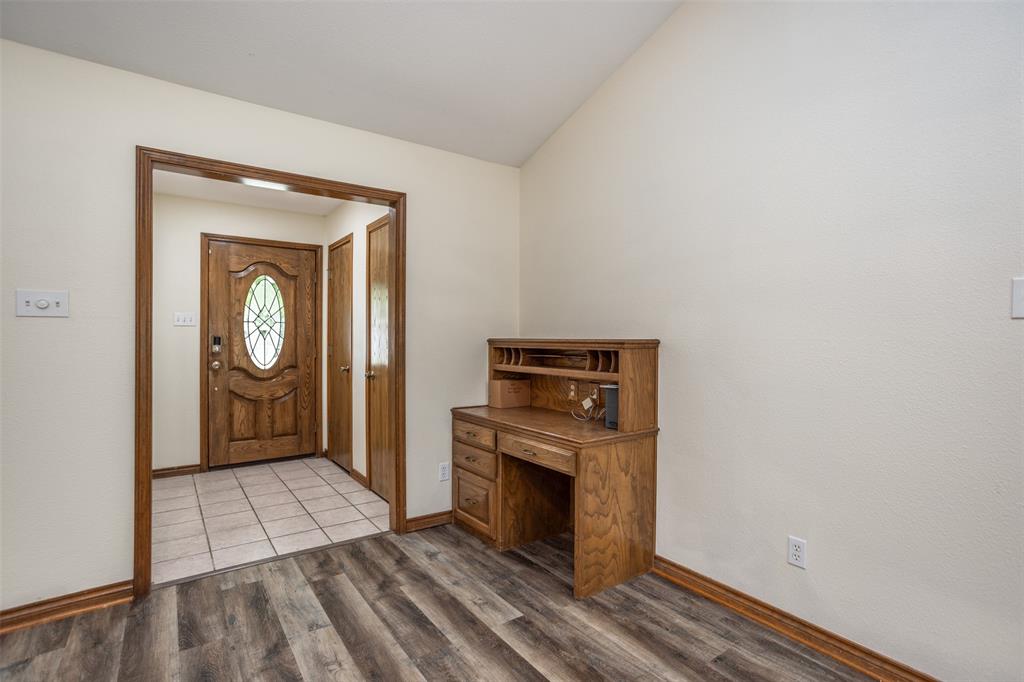 292 Old Spanish Trail Valley View, TX 76272 - Photo 5 of 40 Entryway featuring wood finished floors and vaulted ceiling