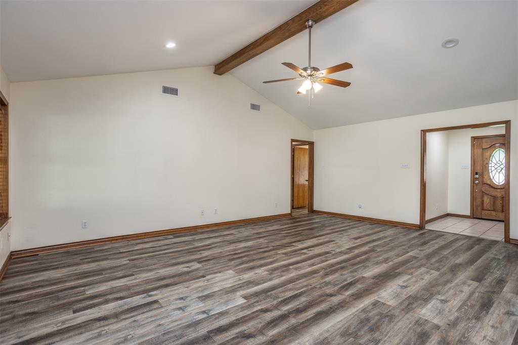 292 Old Spanish Trail Valley View, TX 76272 - Photo 7 of 40 living room featuring beamed ceiling, wood finished floors, ceiling fan, high vaulted ceiling, and recessed lighting