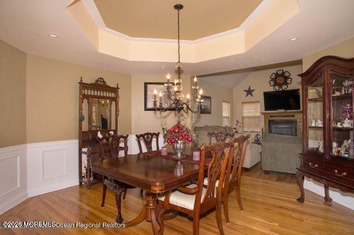467 Leesville Road Jackson, NJ 08527 - Photo 6 of 19 a view of a dining room with furniture and wooden floor