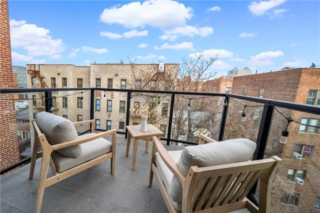 a bedroom with furniture and a couch