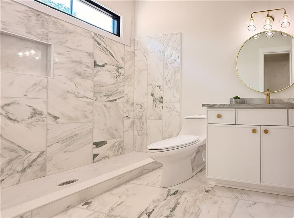 3700 Robinson Road Northeast Marietta, GA 30068 - Photo 21 of 49 a bathroom with a toilet sink and shower