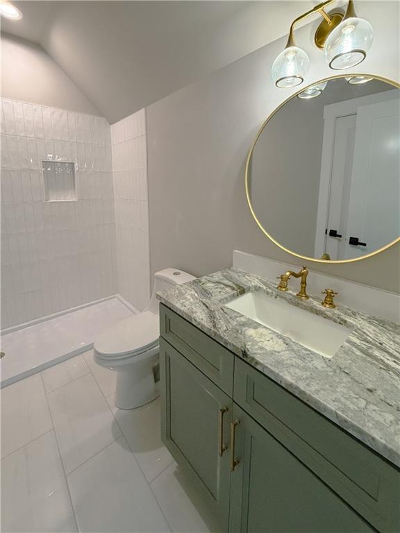 3700 Robinson Road Northeast Marietta, GA 30068 - Photo 28 of 49 a bathroom with a granite countertop sink a toilet and a mirror