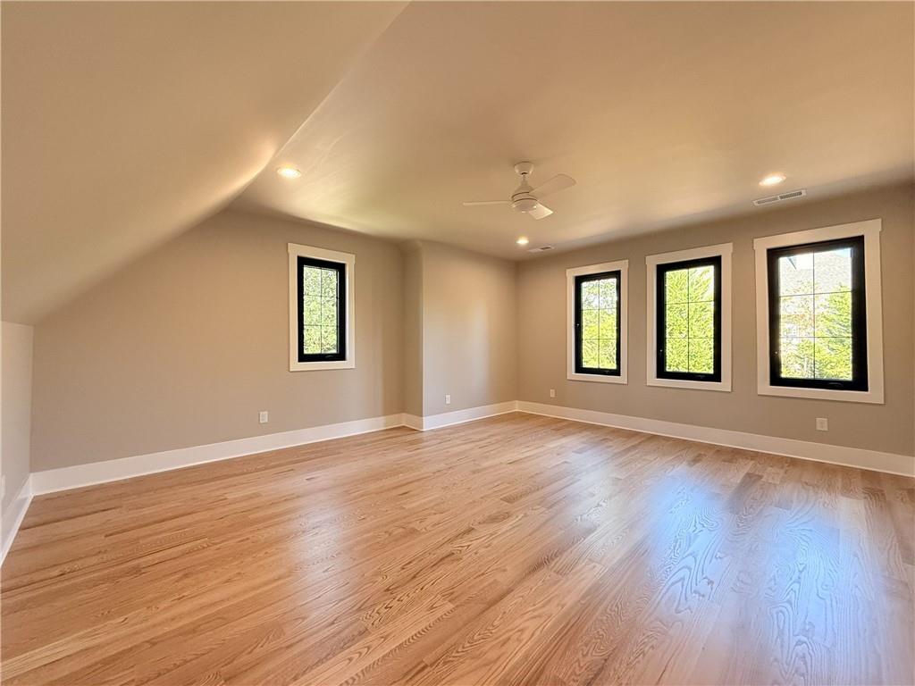 3700 Robinson Road Northeast Marietta, GA 30068 - Photo 31 of 49 a view of an empty room with wooden floor and a window
