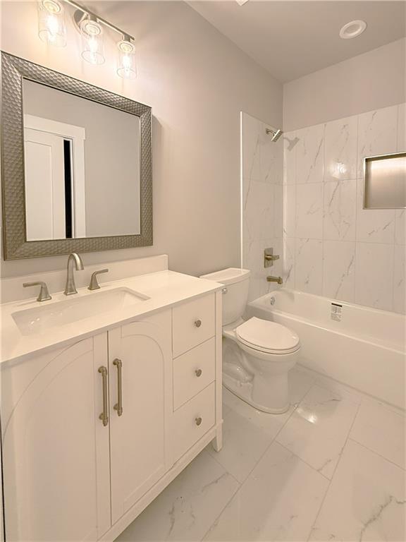 3700 Robinson Road Northeast Marietta, GA 30068 - Photo 34 of 49 a spacious bathroom with a double vanity sink toilet mirror and bathtub