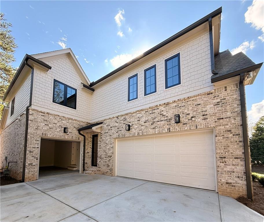 3700 Robinson Road Northeast Marietta, GA 30068 - Photo 44 of 49 a front view of a house with garage