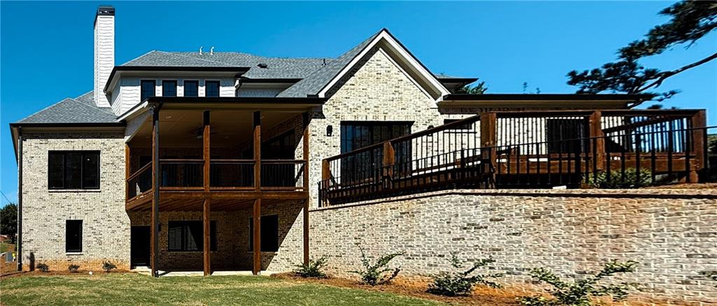 3700 Robinson Road Northeast Marietta, GA 30068 - Photo 45 of 49 a front view of a house with a yard