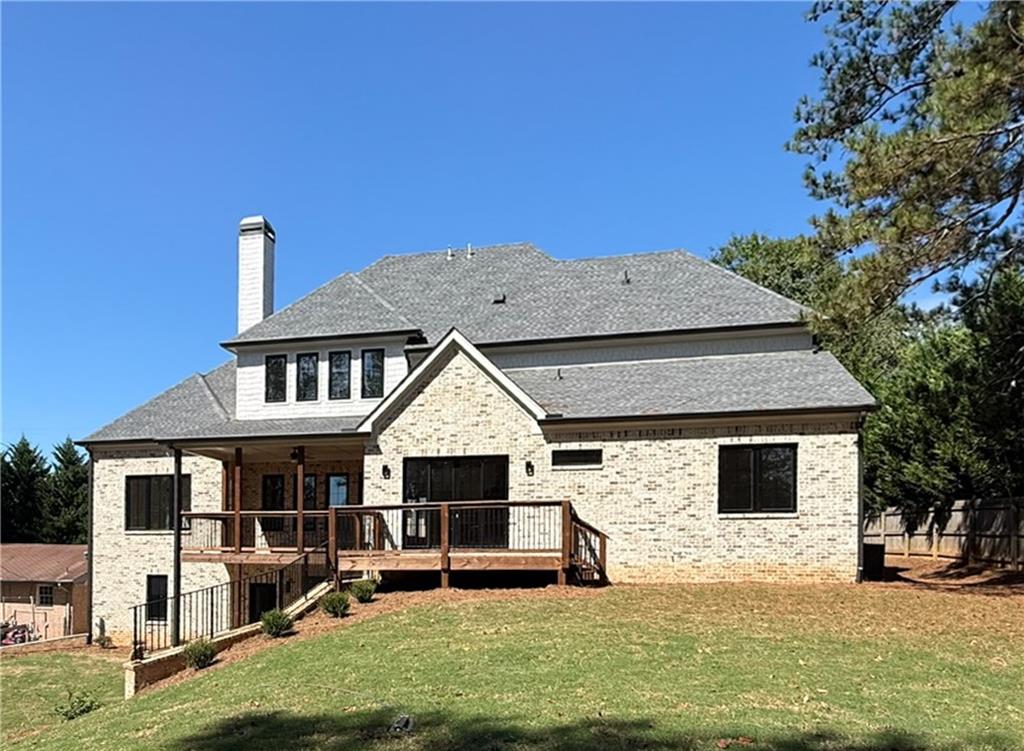3700 Robinson Road Northeast Marietta, GA 30068 - Photo 46 of 49 a front view of a house with a yard