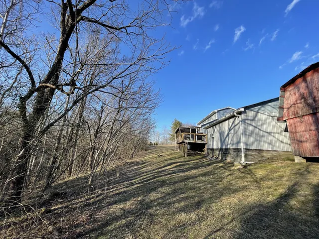 a house with trees in the background