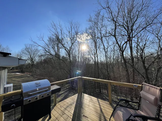 a view of a balcony with a bench