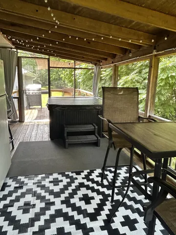 a room with furniture and a rug