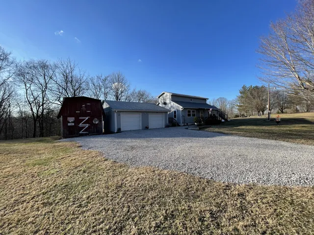 a view of a car in front of a house