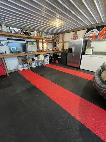a room with lots of furniture and clutter