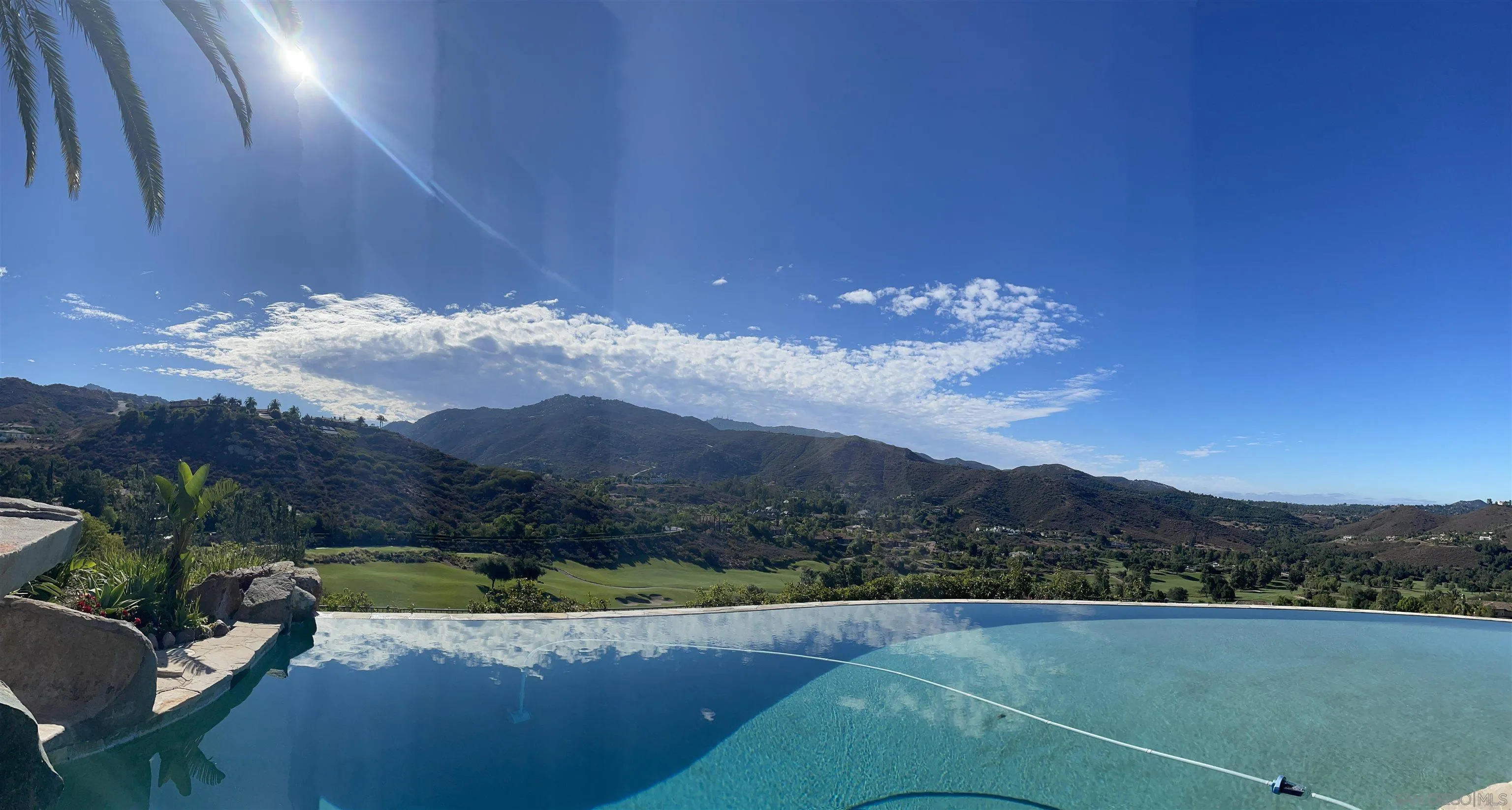 14155 Bryce Point Poway, CA 92064 - Photo 12 of 71 a view of a lake with a mountain in the background