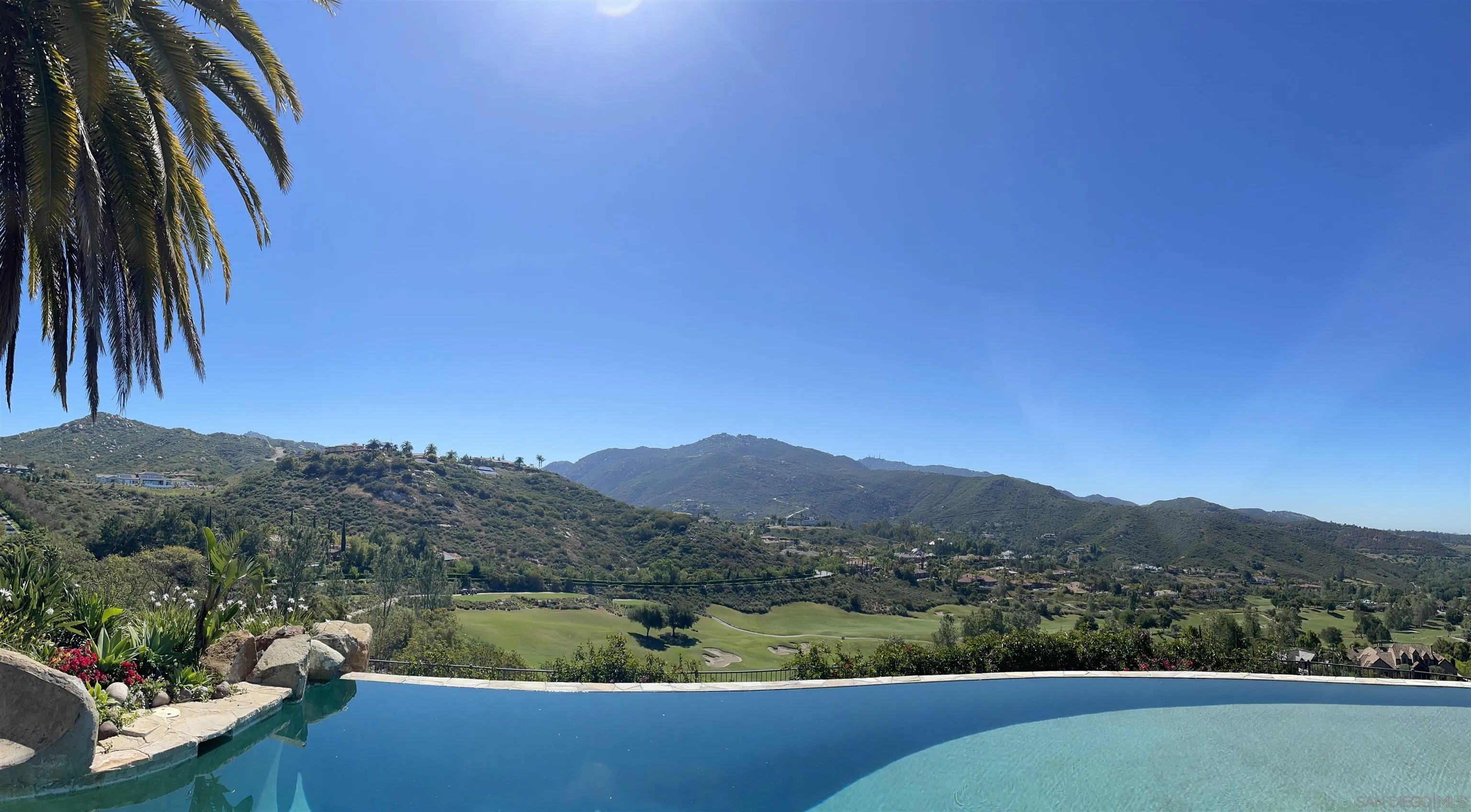 14155 Bryce Point Poway, CA 92064 - Photo 13 of 71 a view of a lake with a mountain in the background