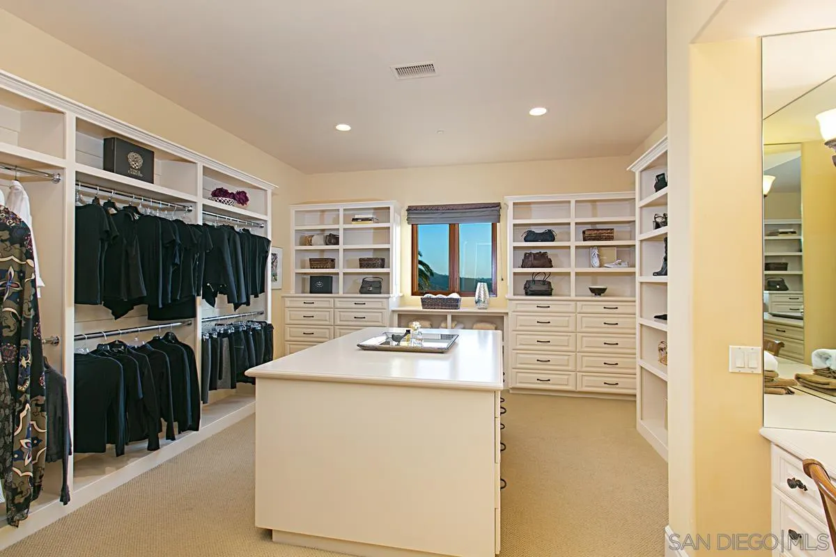14155 Bryce Point Poway, CA 92064 - Photo 35 of 71 a kitchen with a stove a sink and a refrigerator