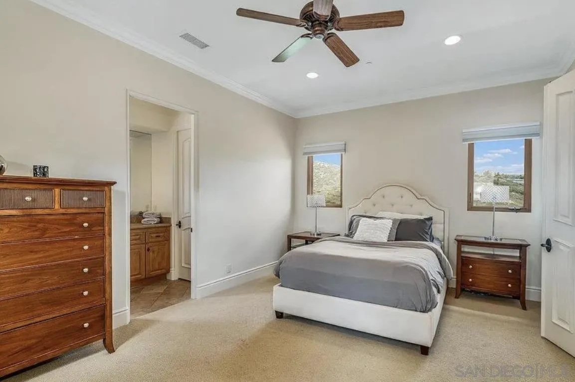 14155 Bryce Point Poway, CA 92064 - Photo 39 of 71 a bedroom with a bed and a dresser