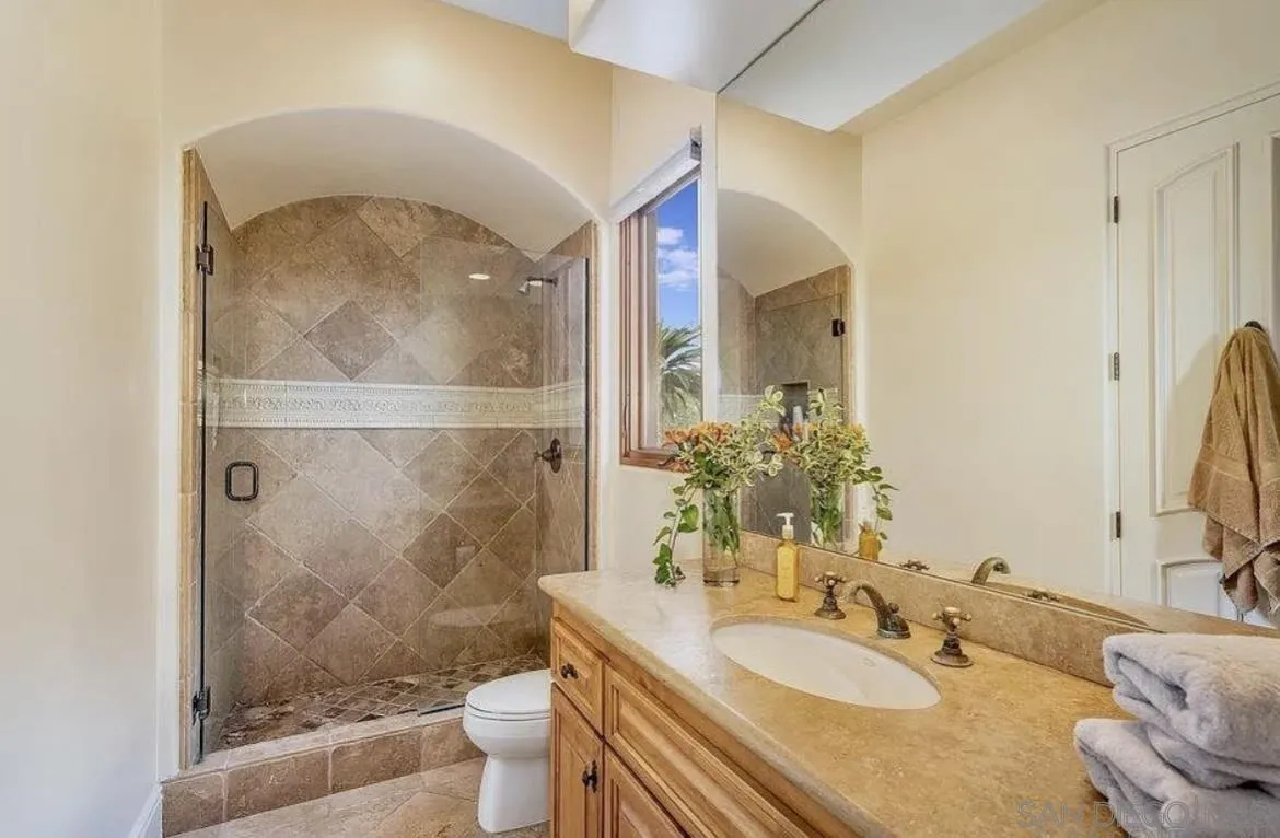 14155 Bryce Point Poway, CA 92064 - Photo 40 of 71 a bathroom with a sink a toilet and shower