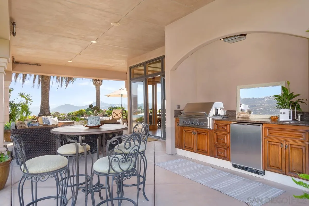 14155 Bryce Point Poway, CA 92064 - Photo 54 of 71 a view of a dining room with furniture window and outside view