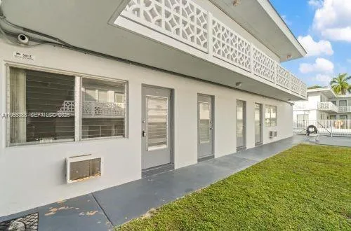 a view of a house with a swimming pool