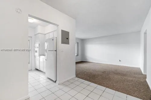 a view of a hallway with a white walls