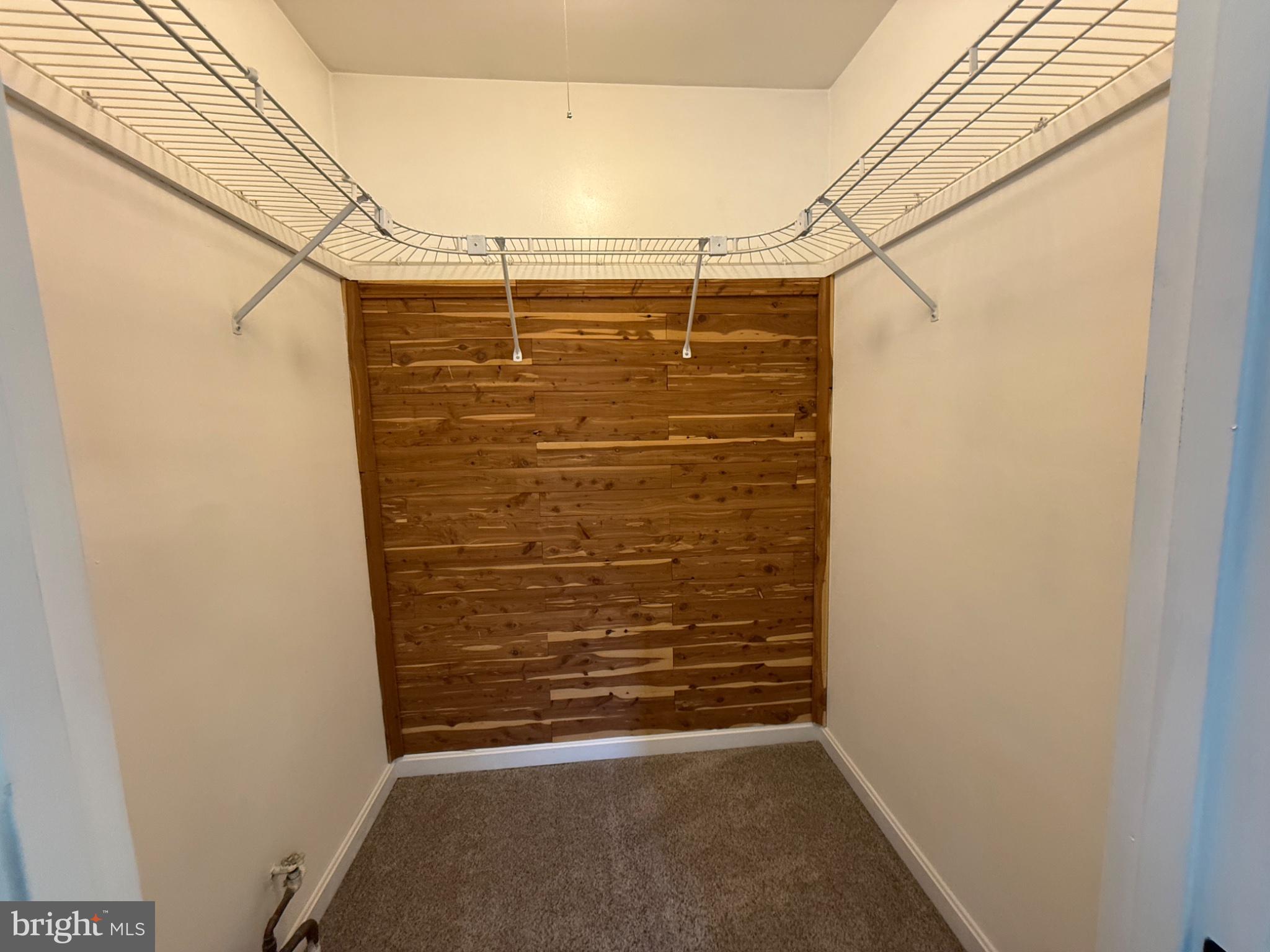416 Breslin Road Joppa, MD 21085 - Photo 19 of 32 Spacious closet with wooden accents.