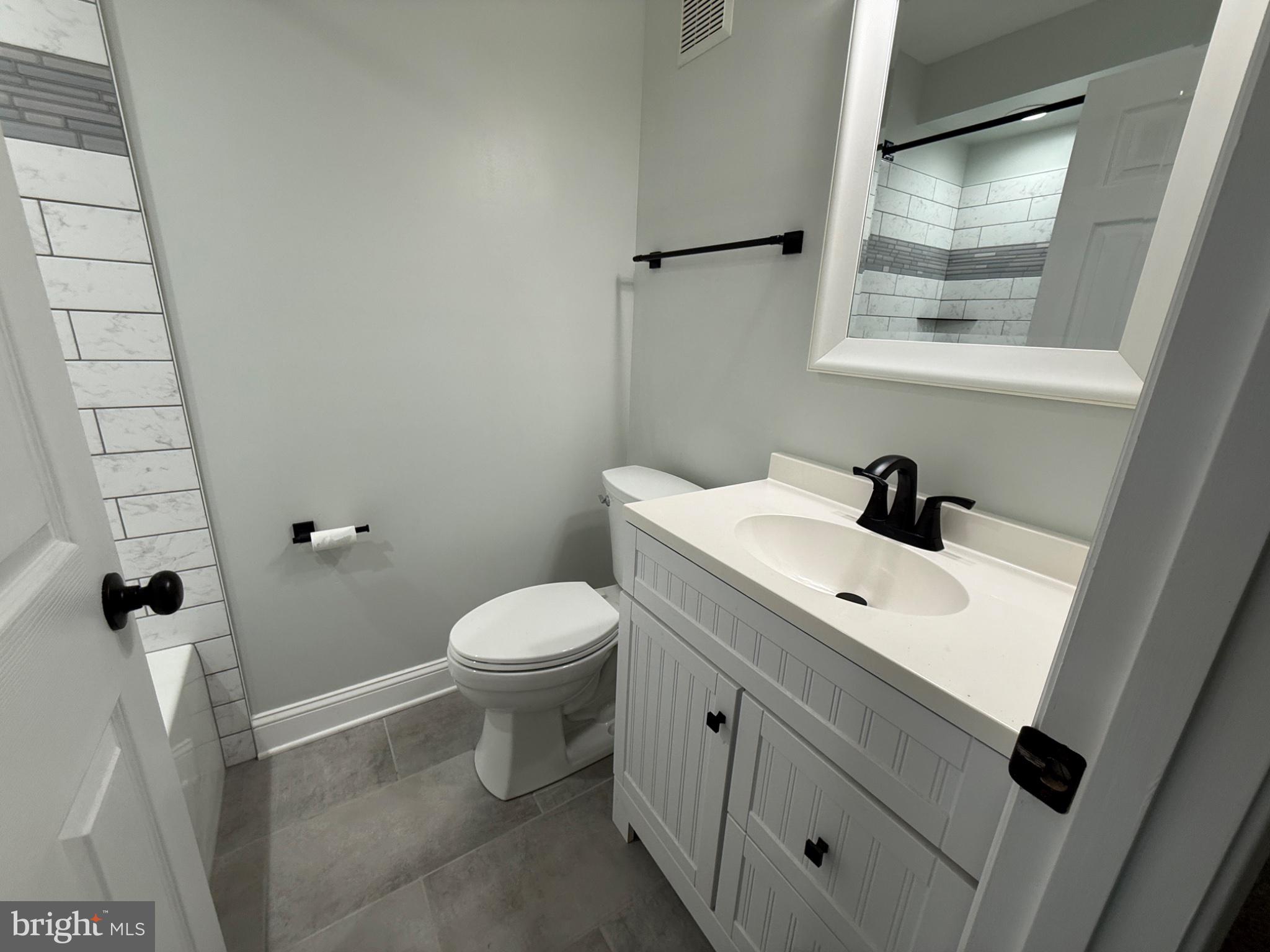 416 Breslin Road Joppa, MD 21085 - Photo 26 of 32 Sleek and modern bathroom retreat.
