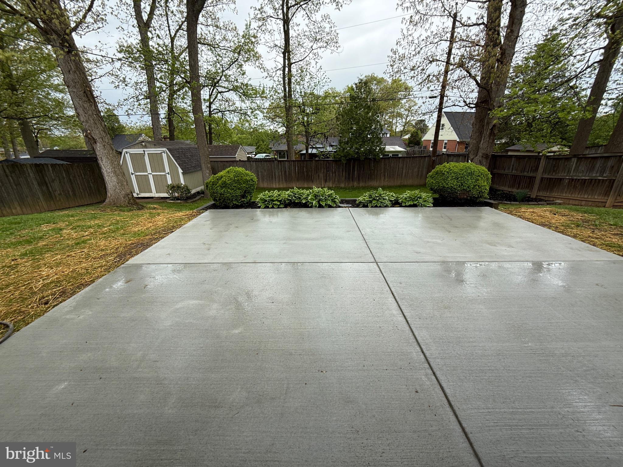 416 Breslin Road Joppa, MD 21085 - Photo 30 of 32 Spacious patio surrounded by greenery.