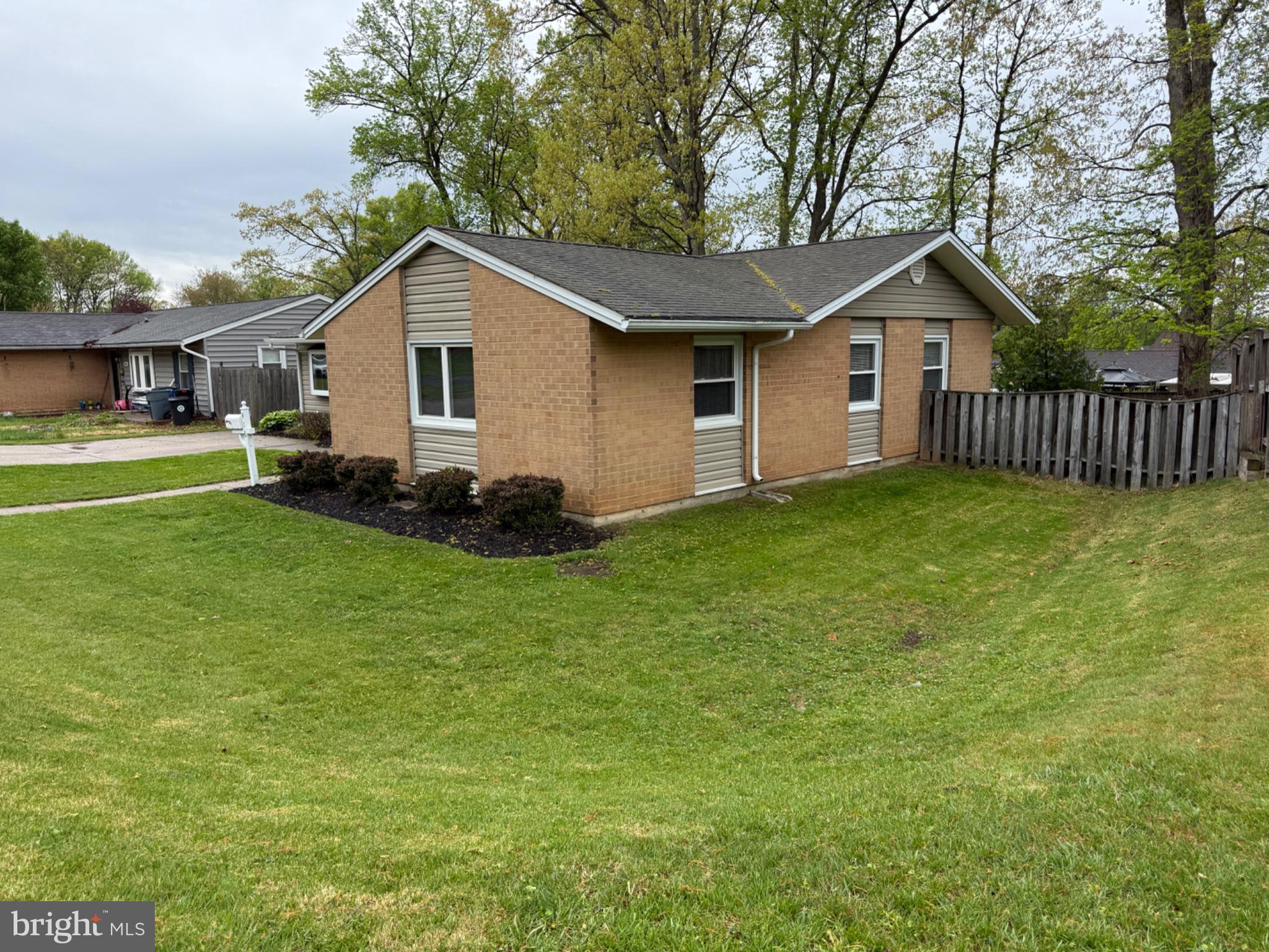 416 Breslin Road Joppa, MD 21085 - Photo 4 of 32 Charming brick home with lush greenery.