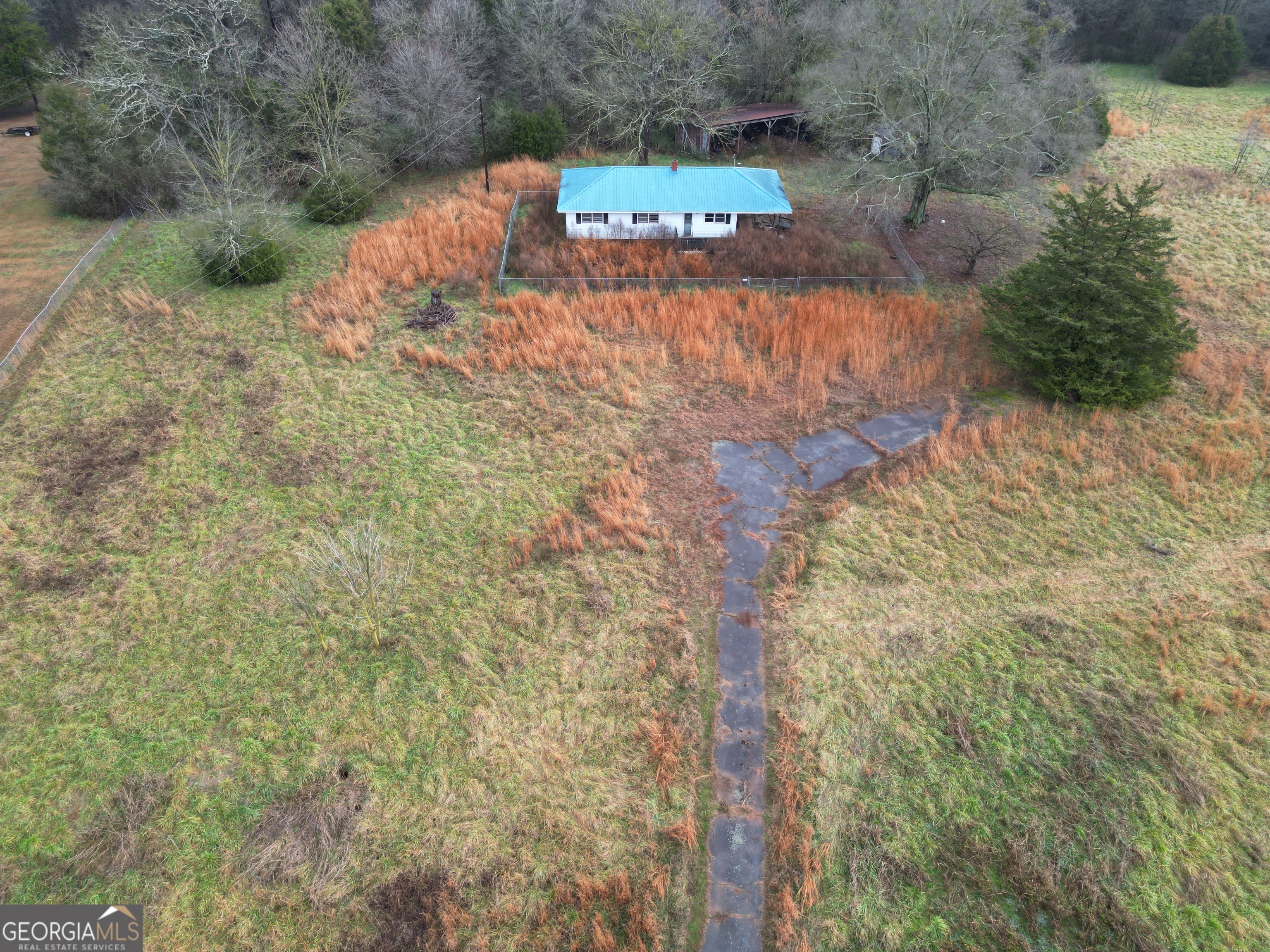 6050 Sandy Cross Road Carnesville, GA 30521 - Photo 3 of 5 a view of a yard with an outdoor space