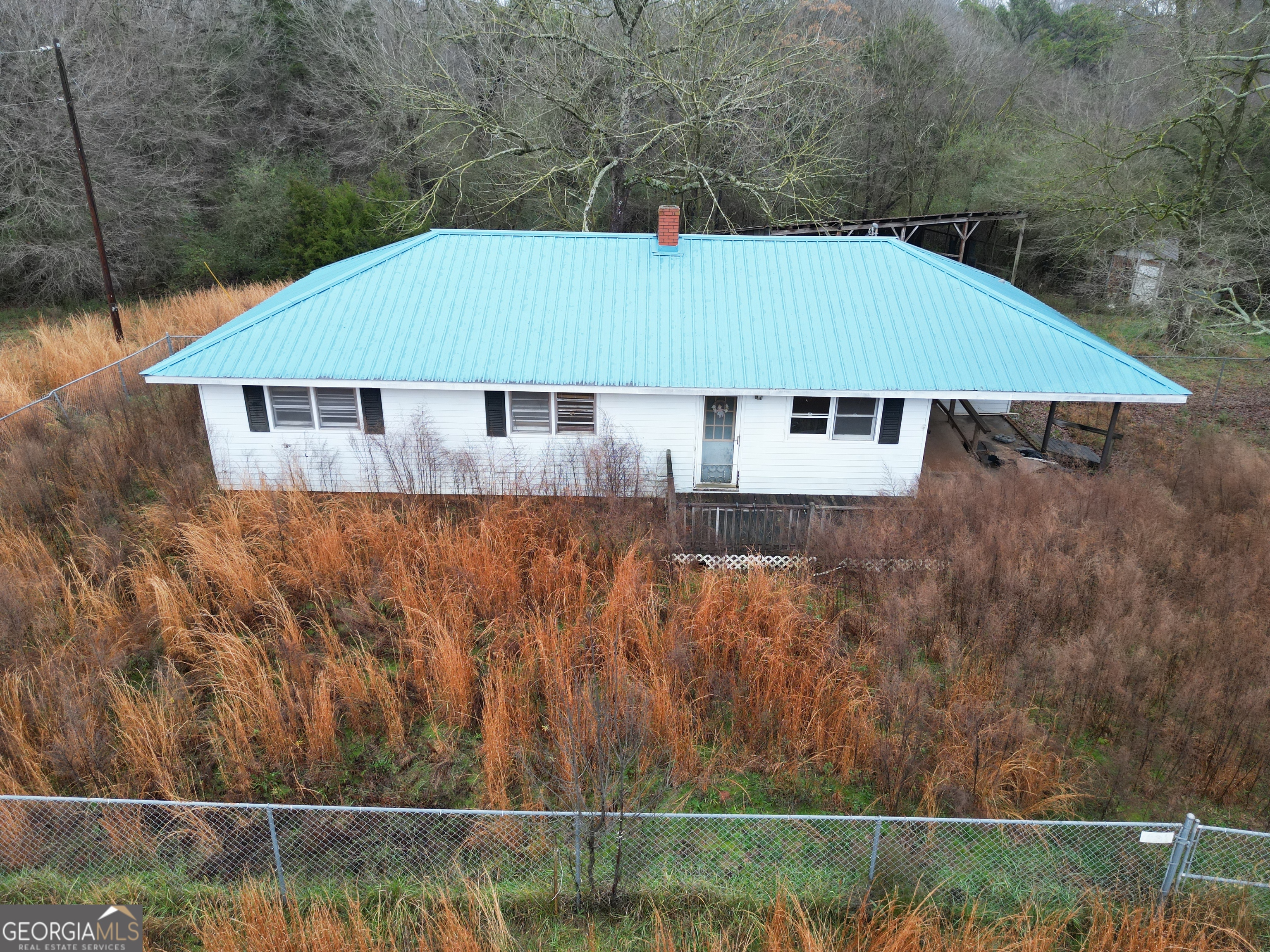 6050 Sandy Cross Road Carnesville, GA 30521 - Photo 4 of 5 an aerial view of a house