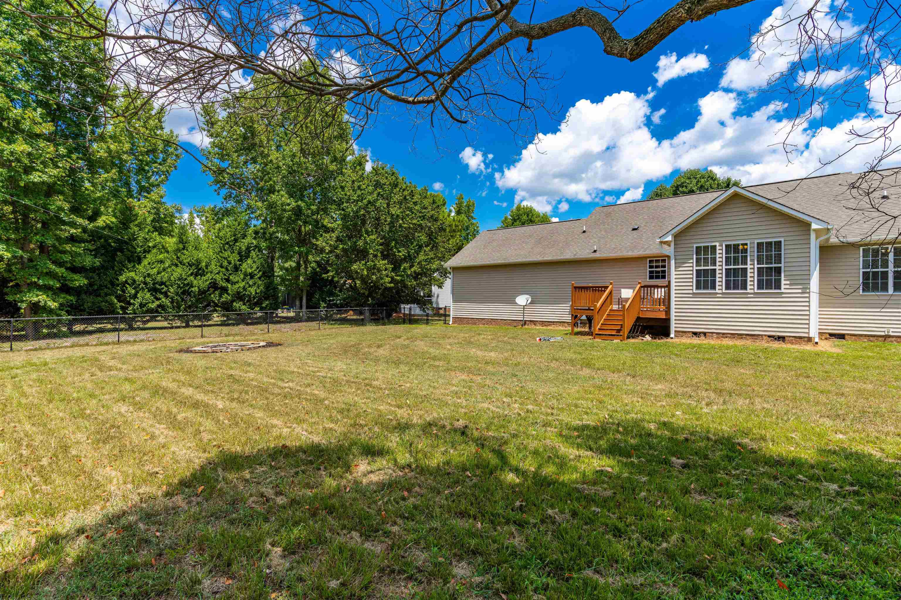 7200 Sunset View Court Willow Spring, NC 27592 - Photo 22 of 25 Terrific yard is fenced and ready for your children or pets! Exterior Back