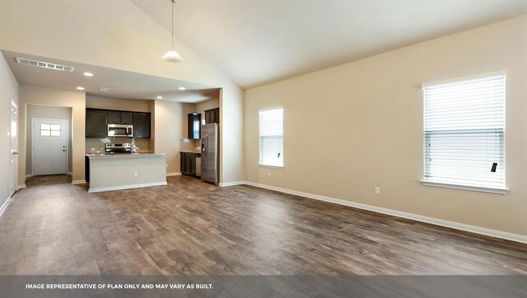 14909 Custis Lane Austin, TX 78725 - Photo 18 of 21 a view of a kitchen with a sink and a window