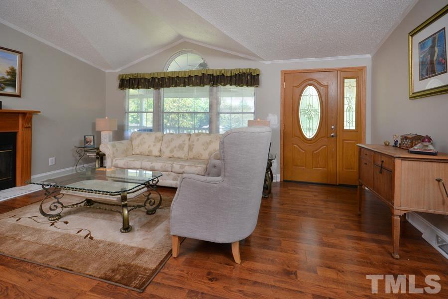 548 Duke Drive Rougemont, NC 27572 - Photo 18 of 43 a living room with furniture and a window