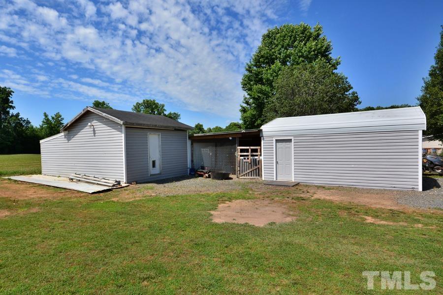 548 Duke Drive Rougemont, NC 27572 - Photo 33 of 43 a view of a house with a yard and garage