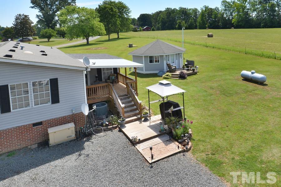 548 Duke Drive Rougemont, NC 27572 - Photo 36 of 43 a view of a swimming pool with a patio and a yard