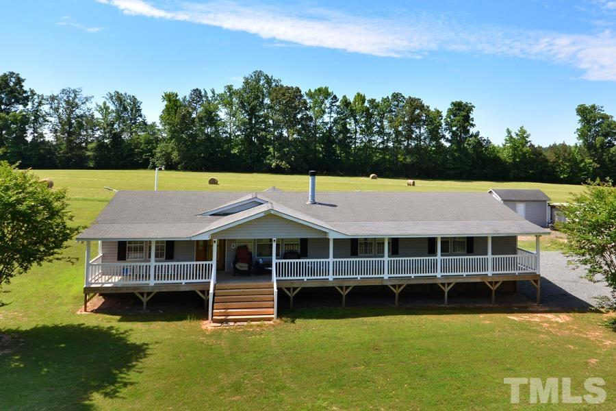 548 Duke Drive Rougemont, NC 27572 - Photo 40 of 43 a view of a house with swimming pool and yard