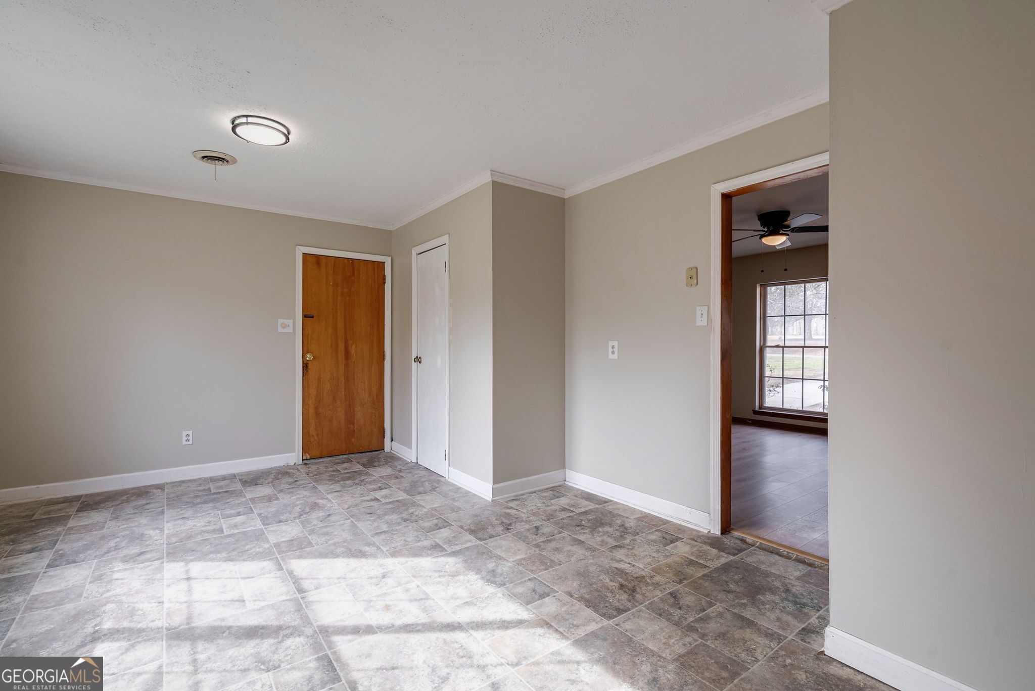 252 Raytown Road Northeast Crawfordville, GA 30631 - Photo 12 of 36 a view of an empty room and window