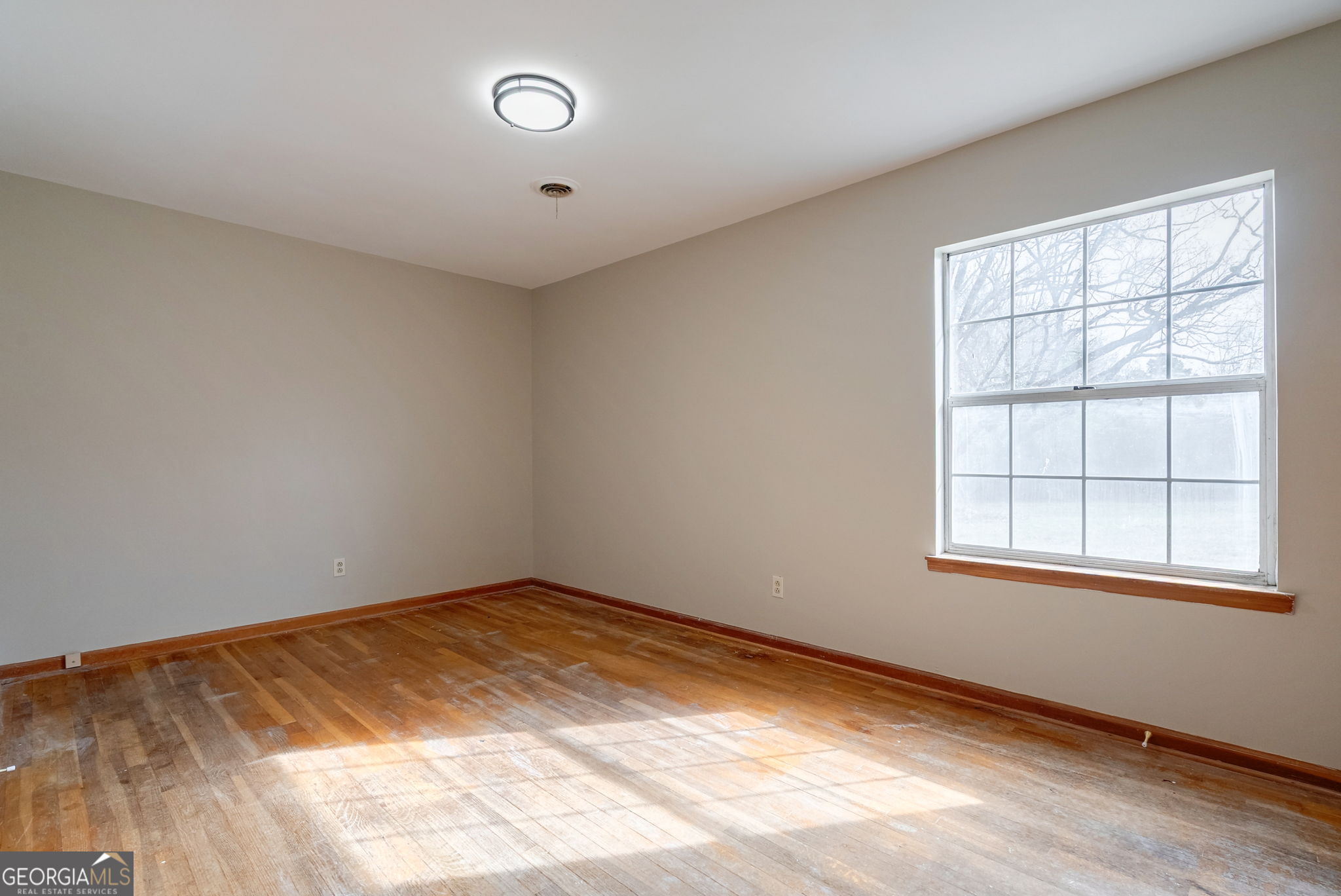 252 Raytown Road Northeast Crawfordville, GA 30631 - Photo 14 of 36 an empty room with a window