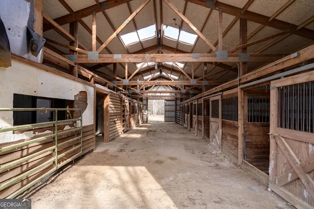a view of an empty room with a tv