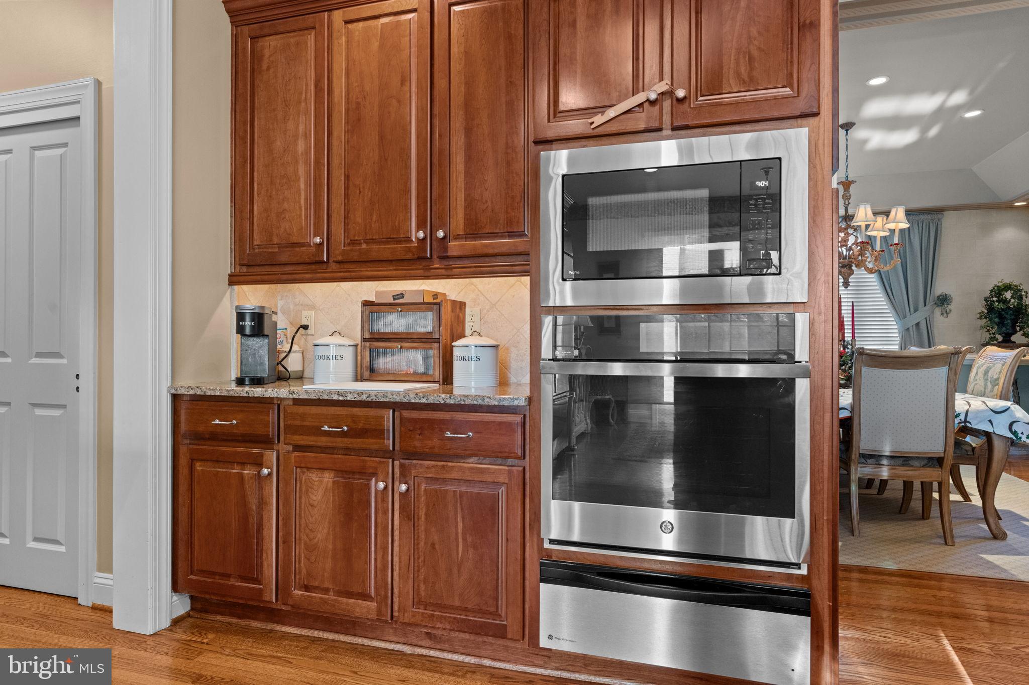 2175 Jefferson Lane Huntingdon Valley, PA 19006 - Photo 20 of 95 a kitchen with granite countertop a refrigerator stove and cabinets