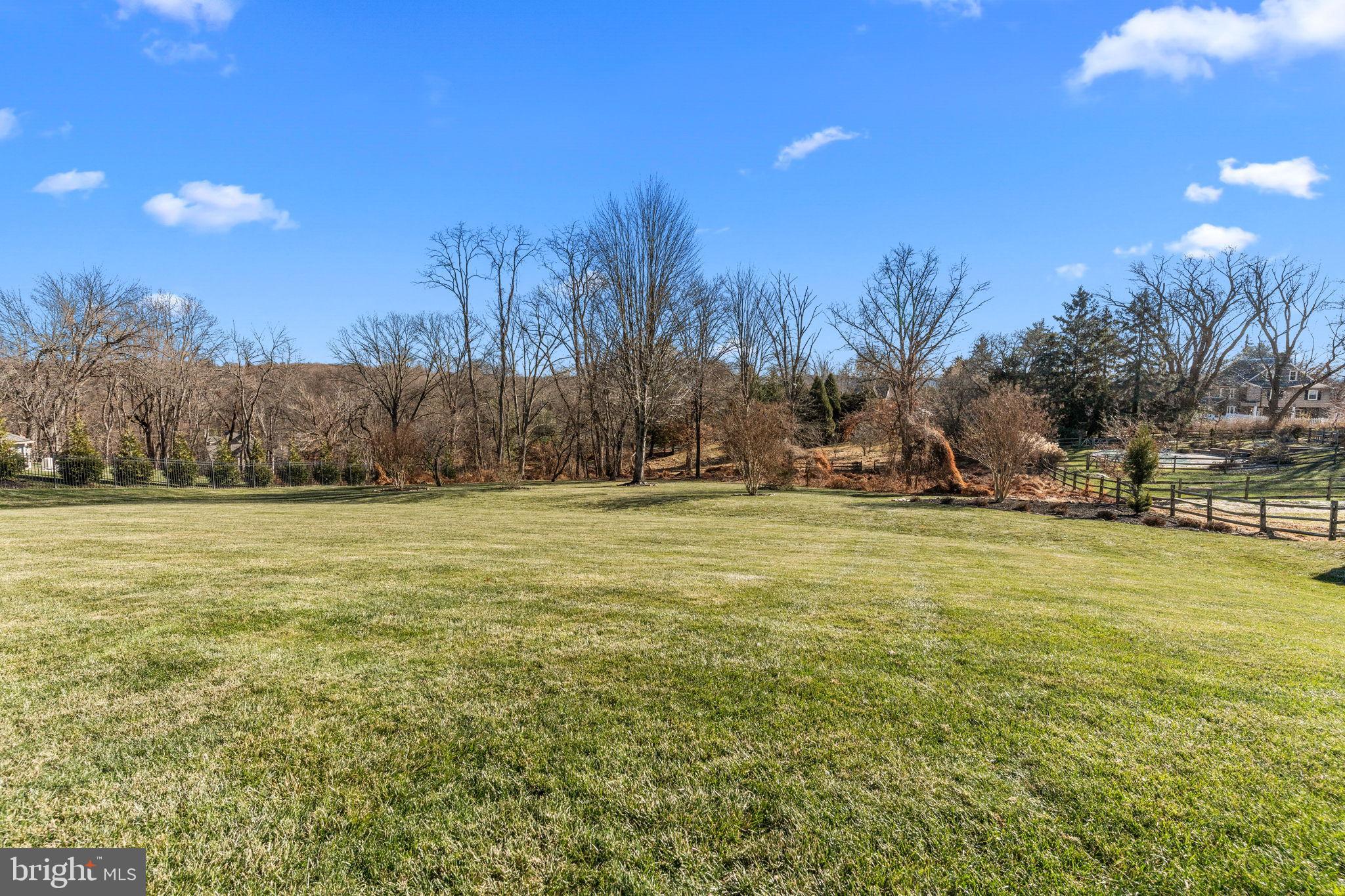 2175 Jefferson Lane Huntingdon Valley, PA 19006 - Photo 68 of 95 Spacious green expanse under a clear sky.
