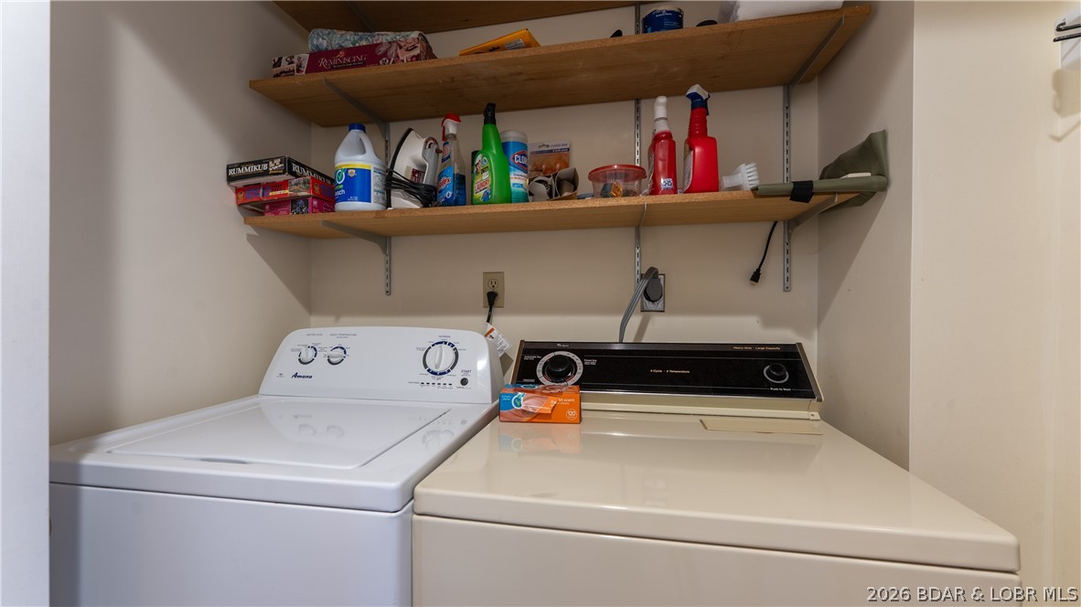 5940 Baydy Peak Road, Unit 123 Osage Beach, MO 65065 - Photo 14 of 43 Laundry closet for full size