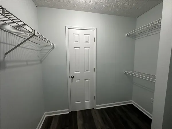 a view of small space with racks on the wall