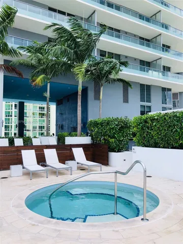 a front view of a house with lake view